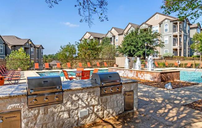 Apartments in San Antonio, TX for Rent - Club at Stone Oak - Poolside Grill Area with BBQs and Counter Space