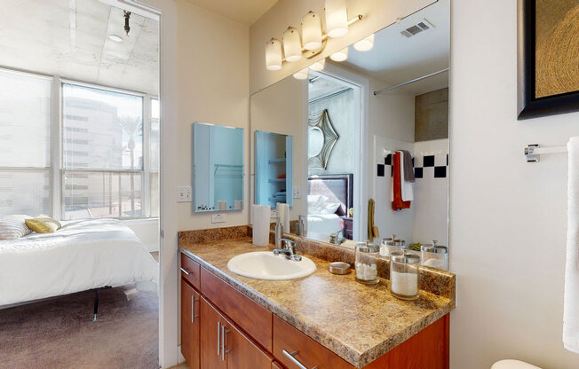 a bathroom with a sink and a mirror