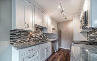 Beautiful Renovated 1 Bedroom Condo with Many Upgrades! Private Balcony! Pool on Site!