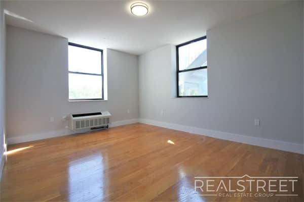 90-02 Queens Blvd