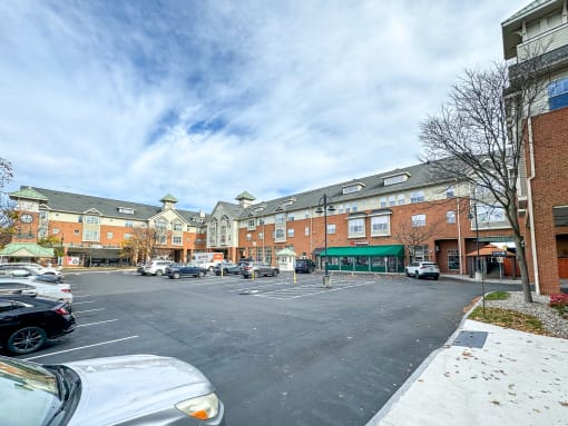 Restaurants and retail shops at street-level and apartments above on the west side Corn Hill Landing on Exchange Boulevard