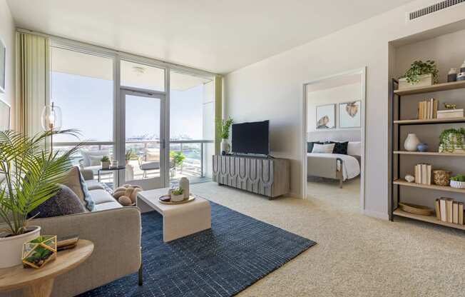 a living room with a couch and a tv  at Vue, California, 90731