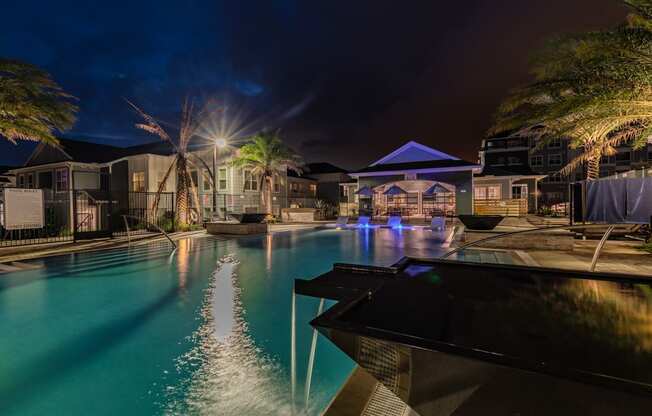 Resort-Style Pool Lit 
Up At Night