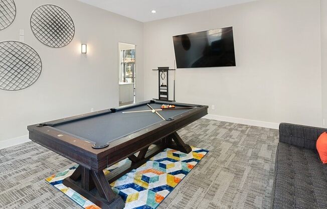Clubhouse game room with pool table
