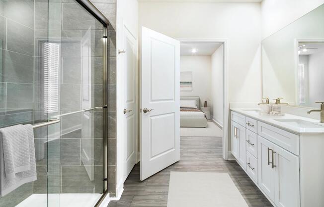 A spacious primary bath at Amavi Brier Creek, finished with clean lines and modern details, moments from the convenience of Durham’s Brier Creek area.