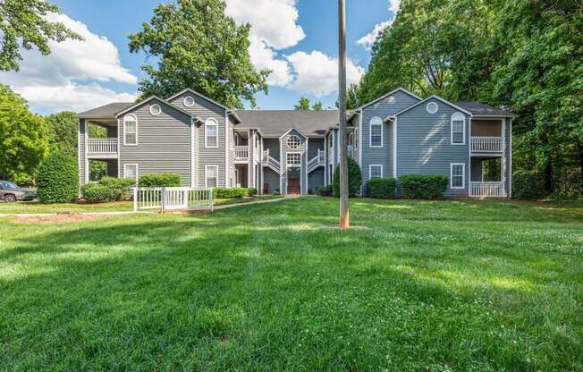 a house with a yard in front of it