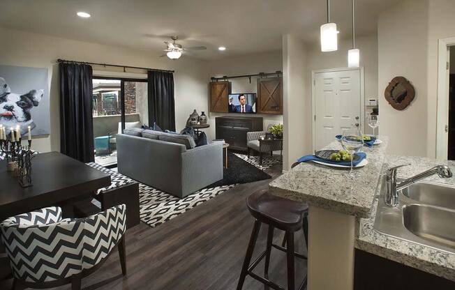 a view of a kitchen and a living room