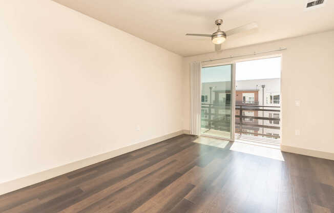 Living Room with Balcony and Hard Surface Flooring