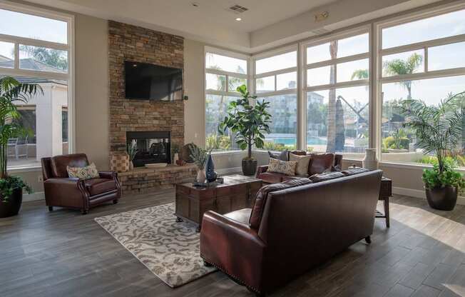 A living room with a fireplace and a couch.
