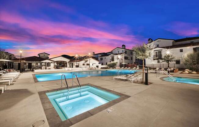 A large outdoor swimming pool with a fountain in the middle at The Villas at Anacapa Canyon, Camarillo, 93012