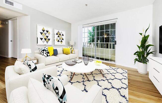 a living room filled with furniture and a large window