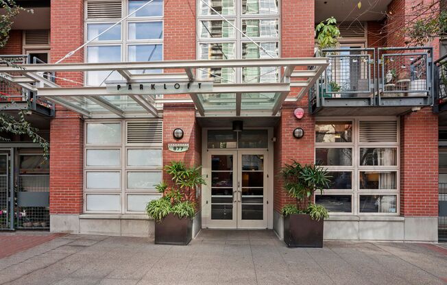 Expansive East Village loft at Parkloft, available now! 1 parking space included! Small pet OK!