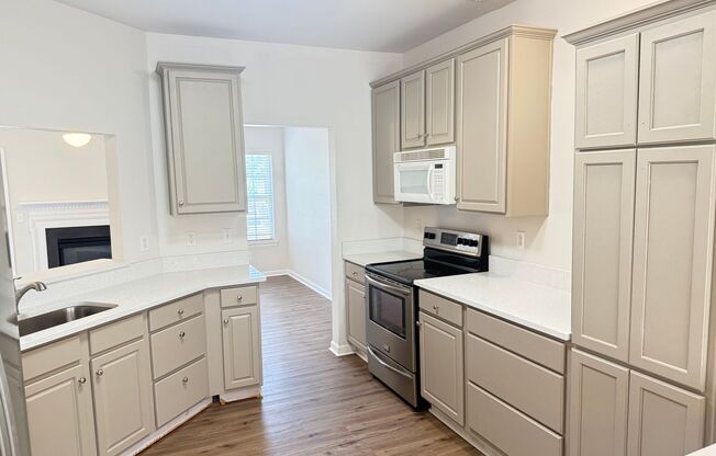 Renovated Cornelius Townhome with Garage, Pool & Elevated Rear Deck