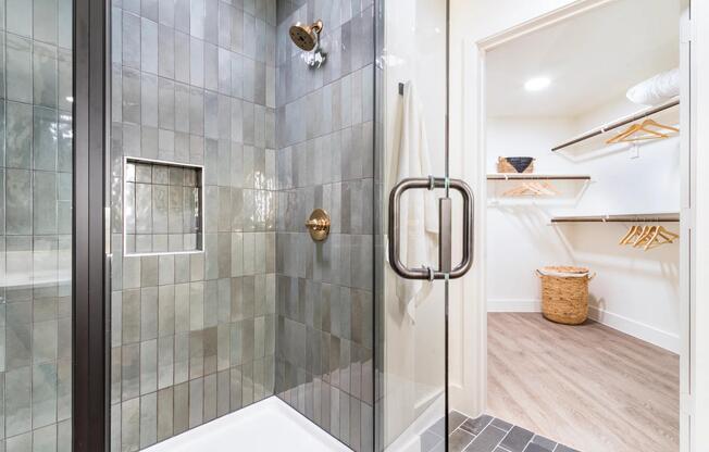 Enjoy sleek tile showers and oversized closets at Modera St. Paul, where refined finishes and thoughtful details elevate everyday living in Dallas.