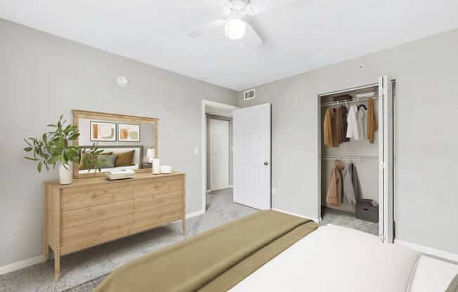 a bedroom with a bed and a closet
