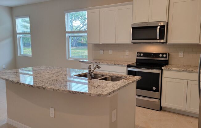Annual UNfurnished almost BRAND NEW 3/2 1/2 townhome with water view