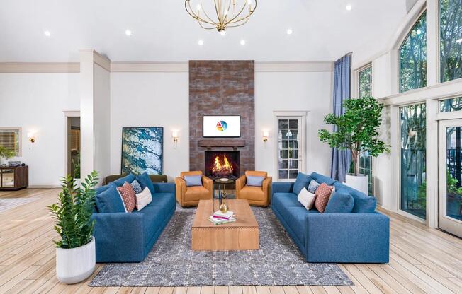 Warm finishes, cozy seating, and a fireplace focal point create a welcoming space to connect or unwind.