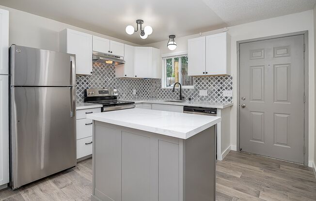 Breathtaking Renovation! Oversized 2 Bed 1.5 Bath Townhome! Ready Now! Don't Miss Out!