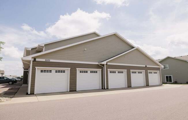A large garage with four doors is numbered 2980.