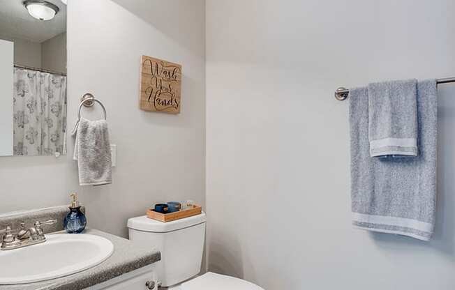 Bathroom with Hardwood Style Flooring