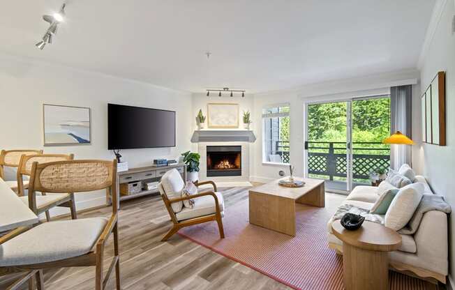 a living room with a fireplace and a television