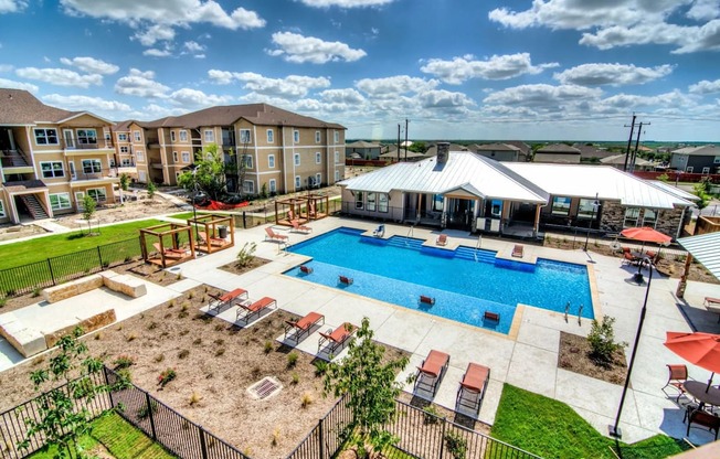 take a dip in our resort style pool at Villa Espada Apartments, San Antonio, Texas