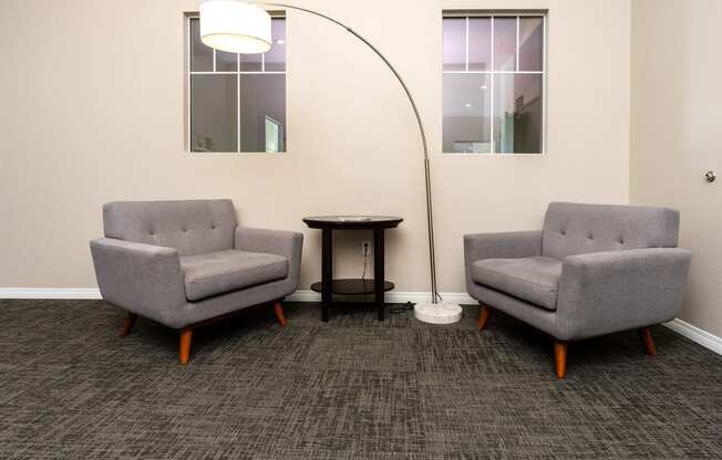 chairs and lamp in library