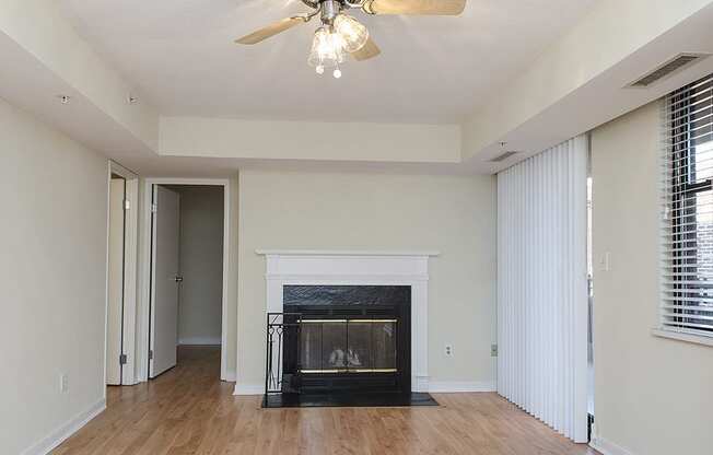 One-bedroom apartment living area with fireplace at 1633 Q, Washington