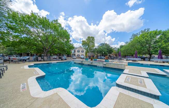 take a dip in the resort style pool at villas at houston levee west apartments