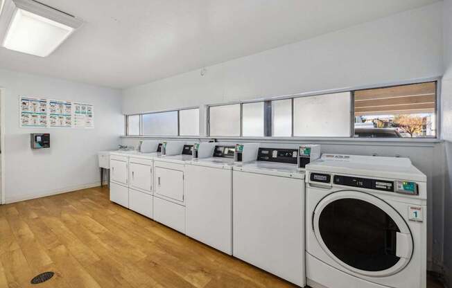 A laundry room with a washer and dryer.