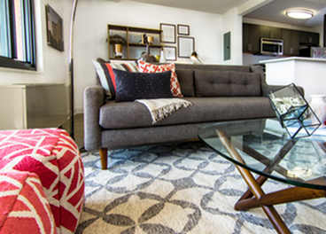 Living room with a comfortable couch at The Graham at Southern Towers, Virginia, 22311