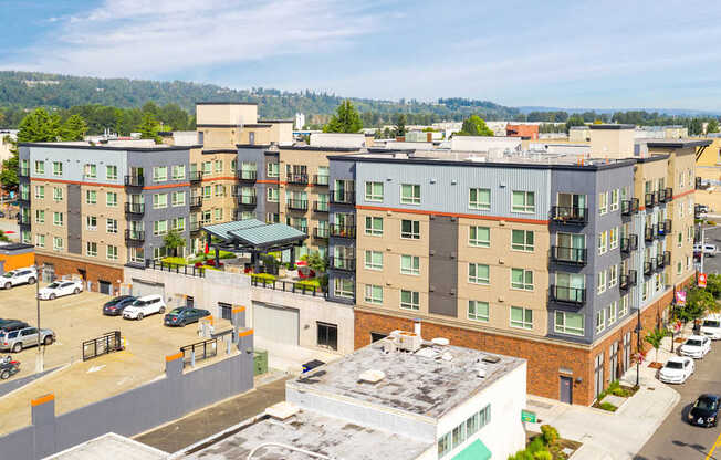 an aerial view of an apartment building in a city