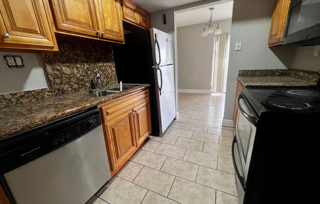 3 Bedroom 2 Bath Millennium Palms Condo with Fresh Paint and New Carpet!