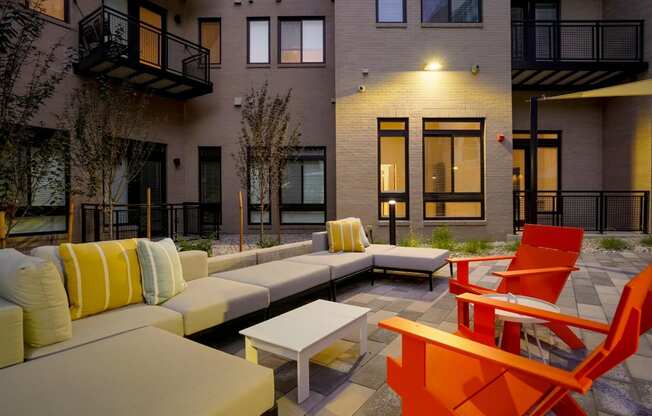 an outdoor lounge space at The Parallel apartments