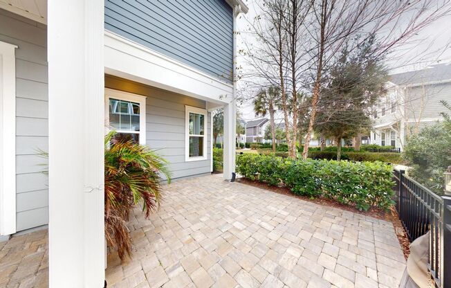 Single-family Courtyard Home nestled within David Weekley's exclusive enclave of Tidal Pointe!