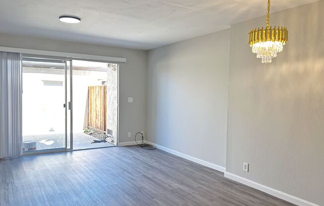 Move-in ready Evergreen townhome with private backyard, detached 2-car garage, and great community amenities