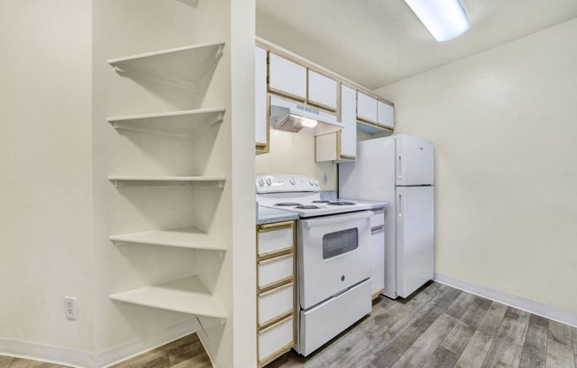 Kitchen With Storage Area at Hampton Park Apartments, Tigard, Oregon