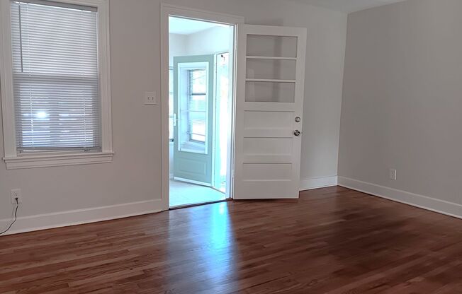 Cutie bungalow features hardwood floors and big back yard