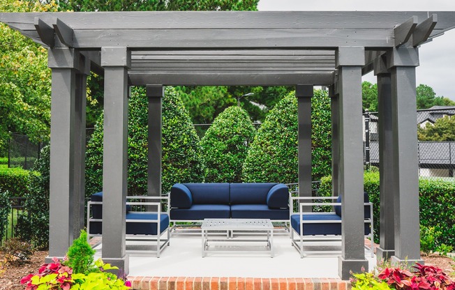 Socialize outdoors in the poolside pergola