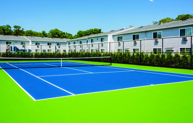 outdoor tennis court green and blue professional at Southwood Luxury Apartments, North Amityville, NY, 11701