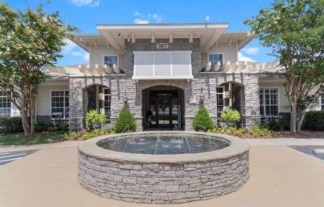 a fountain in front of a building