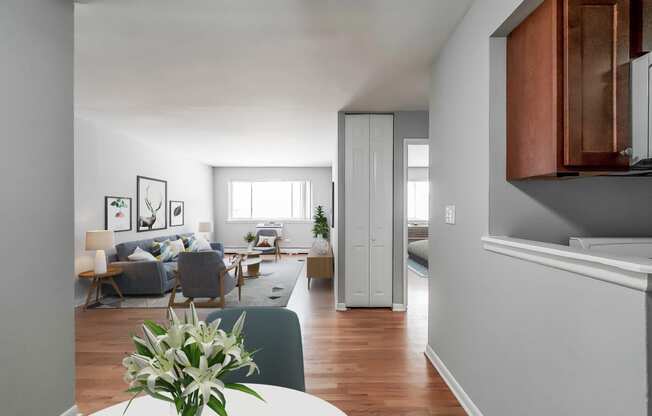 a view of the living room and dining room from the kitchen