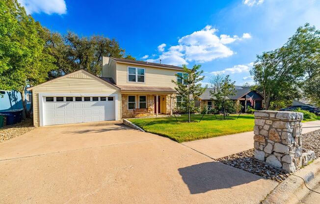 Embrace Style and Comfort Year-Round in this Scenic Brook Retreat – Your Dream Home Awaits!