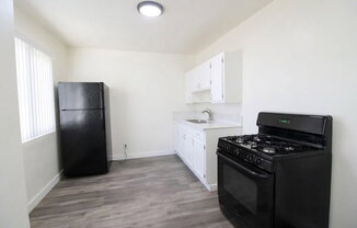 11120 NORMANDIE AVE