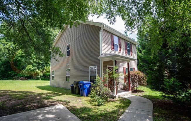 Welcome to this spacious 4-bedroom, 2.5-bathroom house located in Durham, NC