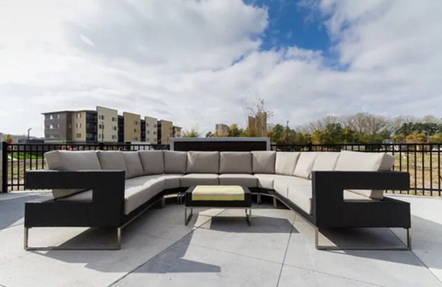 Group seating on rooftop lounge -Des Moines Iowa Apartments | Cityville I