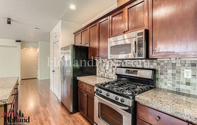 **New Lower Price** Charming 3-Bedroom Open Concept Condo!