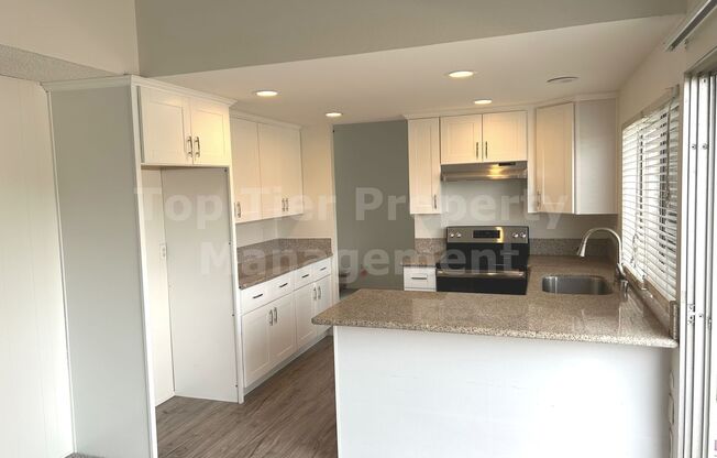 **Updated 4 bed / 2 bath House in Quiet Neighborhood - Available NOW**