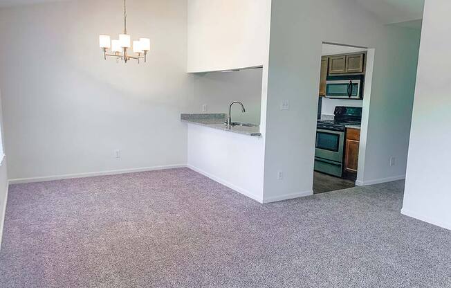Large dining room with kitchen bar at Bexley Village, Indiana
