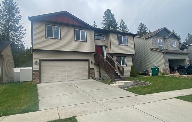 4 bedrooms 3 baths-Mead School District House with attached two car garage